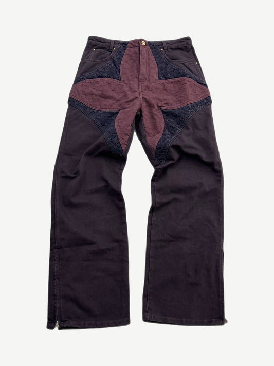 Louis Vuitton maroon monogram flower denim jeans with embroidered LV florals across faded indigo wash