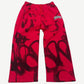 GV Gallery Raspberry Hills red sweatpants with dark graffiti pattern and arched Raspberry leg patch.