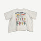 HMDD cream Rasta festival tee with vintage-style red, yellow and green graphic and weathered print finish.