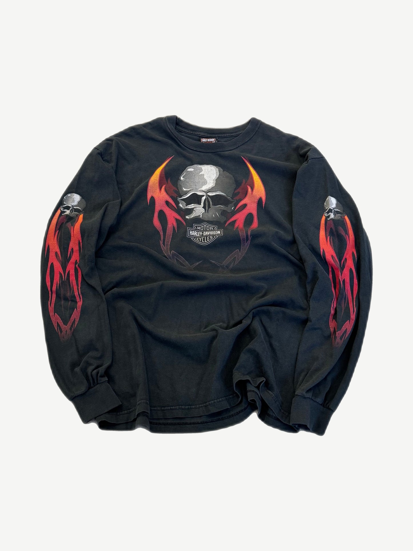 Vintage Harley Davidson Gene Lummus longsleeve in black with flaming skull graphic on front.
