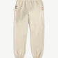 Gallery Dept cream painted logo sweatpants rear view with elastic waist and faded multicolor paint splatters