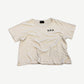 Enfants Riches Deprimes cream cotton tee front with small black E.R.D. logo on chest and crew neckline