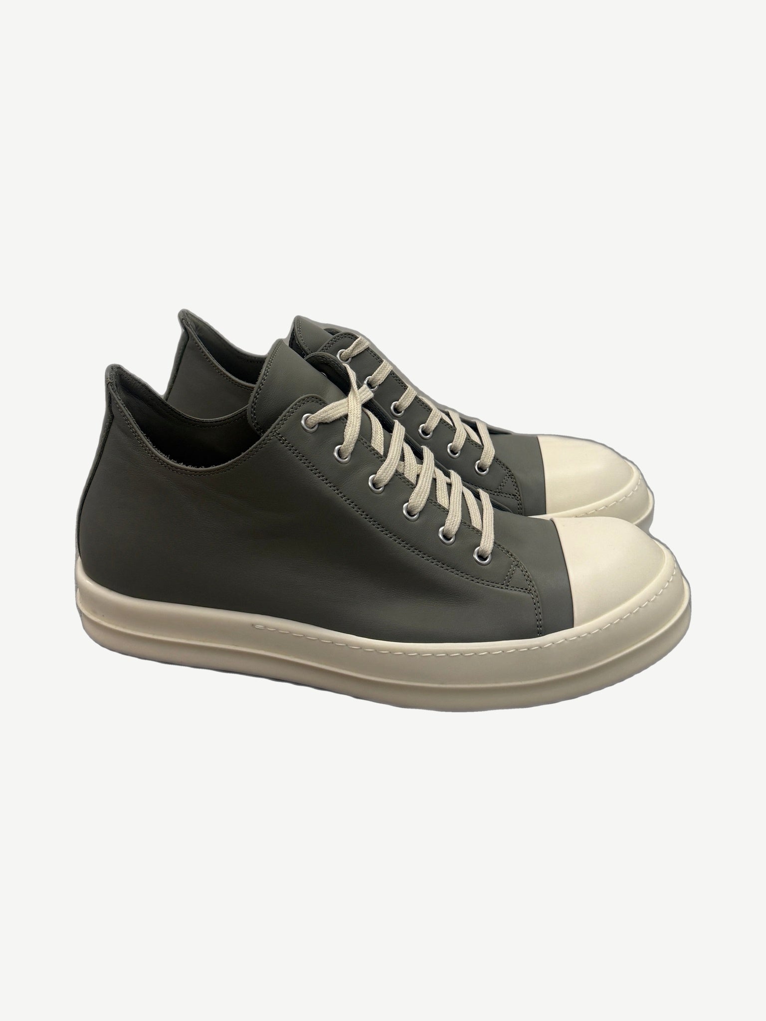 Rick Owens Hollywood low sneakers in celadon gray leather with white rubber cap toe and cream laces, side view