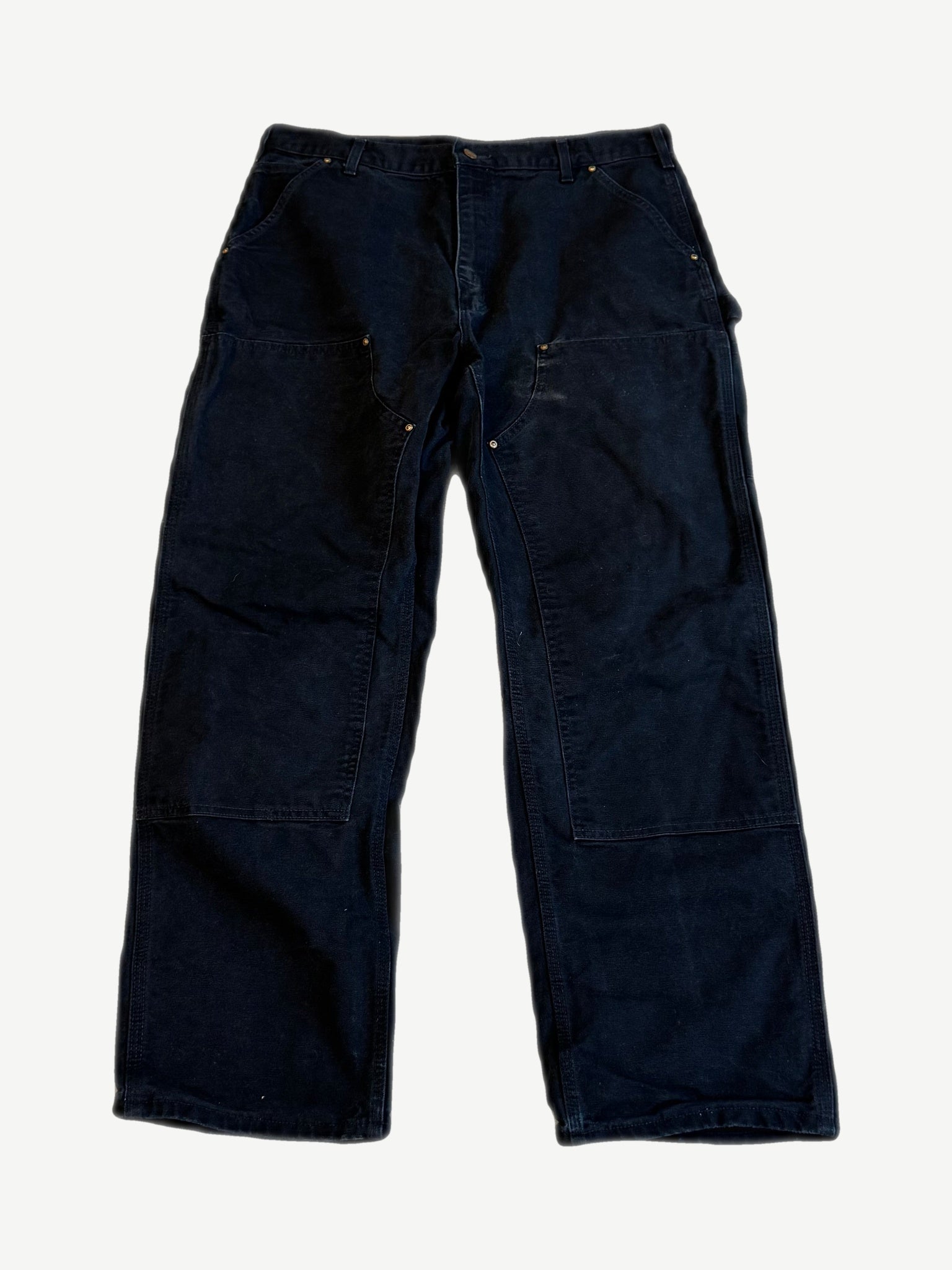 Vintage Carhartt black double knee carpenter pants front with copper rivets and utility hammer loops