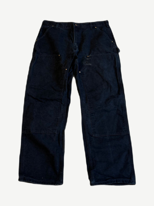 Vintage Carhartt black double knee carpenter pants front with copper rivets and utility hammer loops
