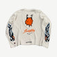 Chrome Hearts Sinister thermal back showing orange devil graphic with In All Ways script and flame sleeves.