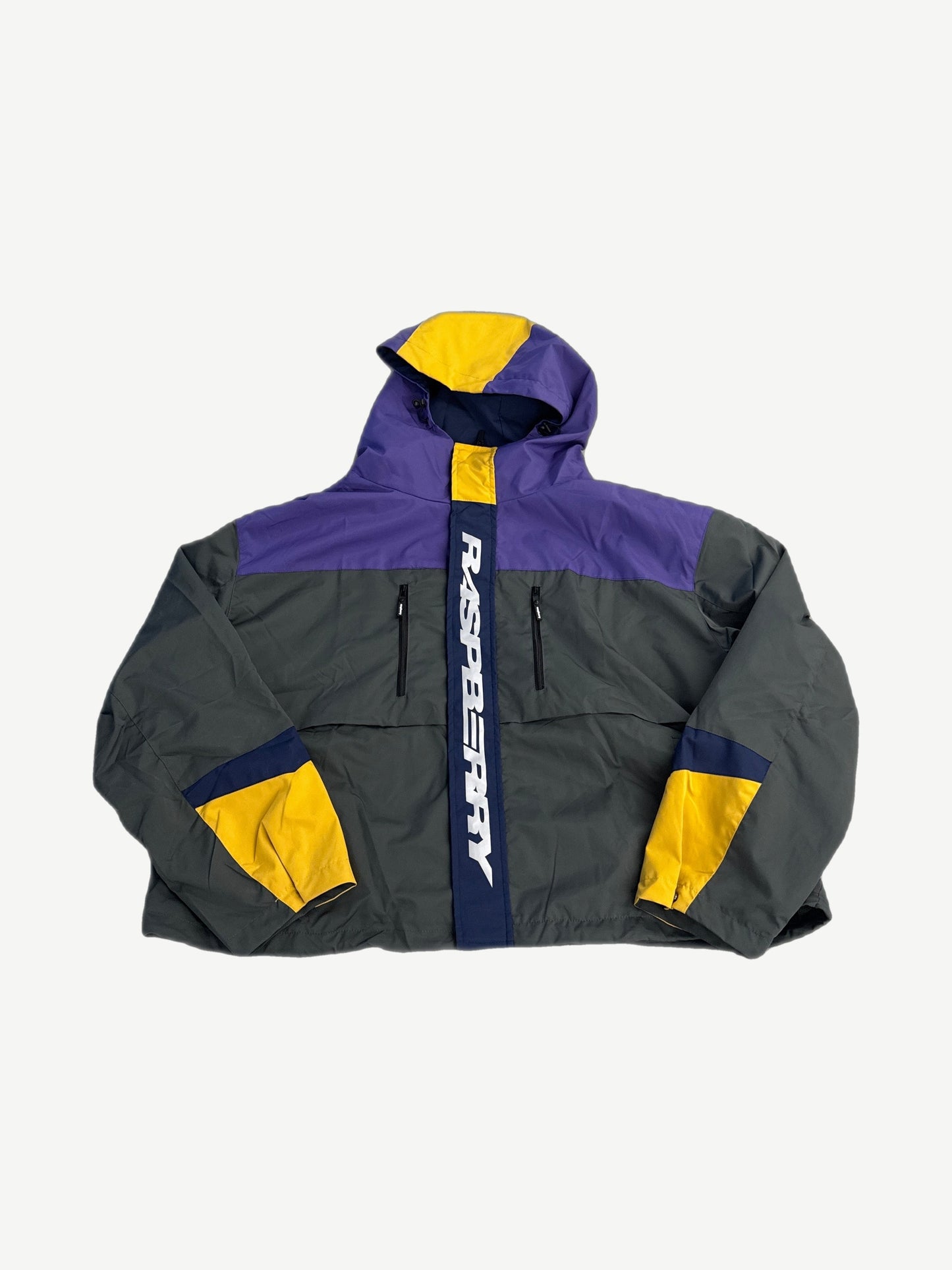 GV Gallery Raspberry Hills charcoal Shanghai rain jacket with purple and yellow color block panels