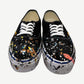 Gallery Dept Art That Kills Vans top view with multicolor paint splatter across black canvas uppers.