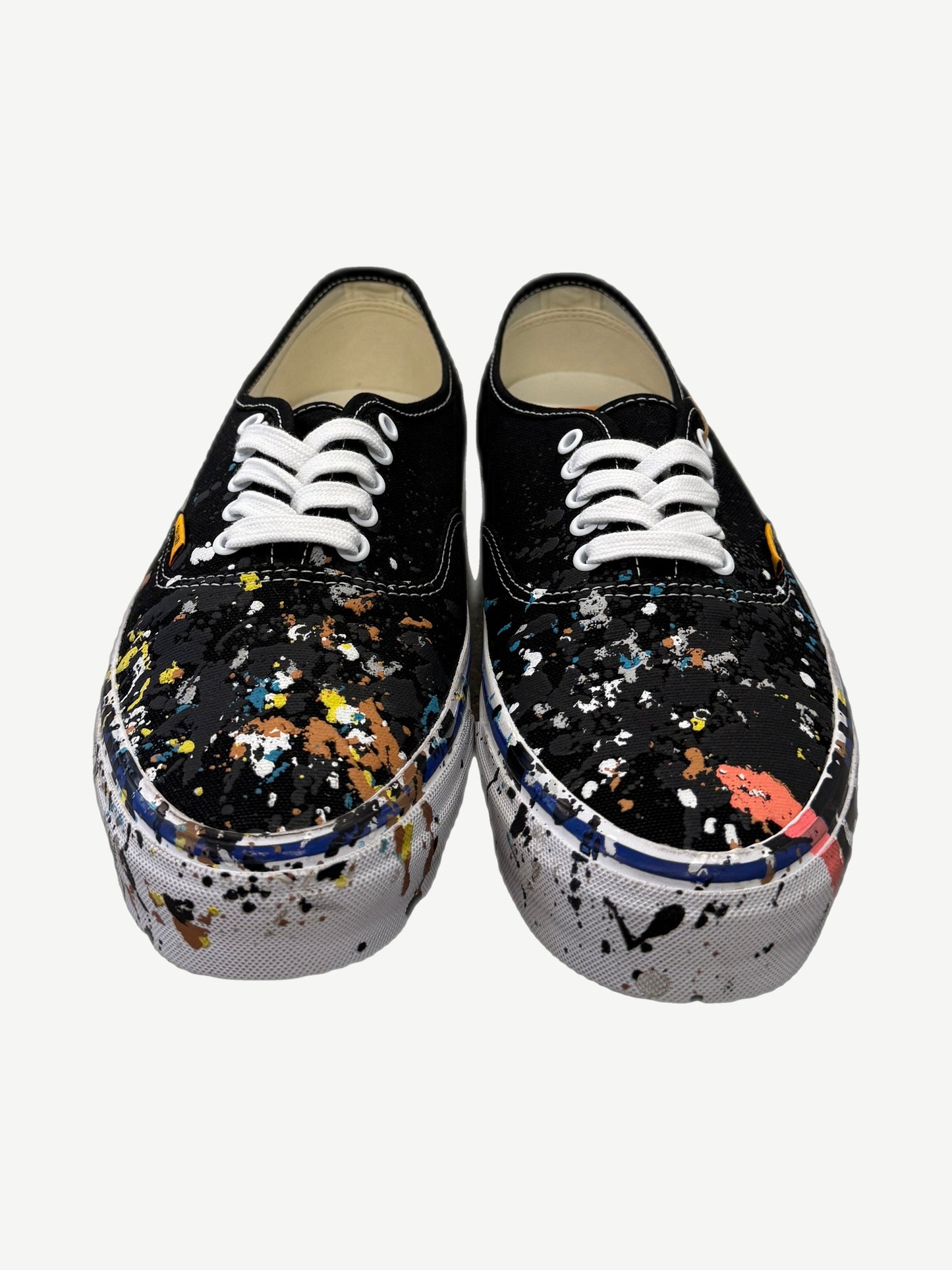 Gallery Dept Art That Kills Vans top view with multicolor paint splatter across black canvas uppers.