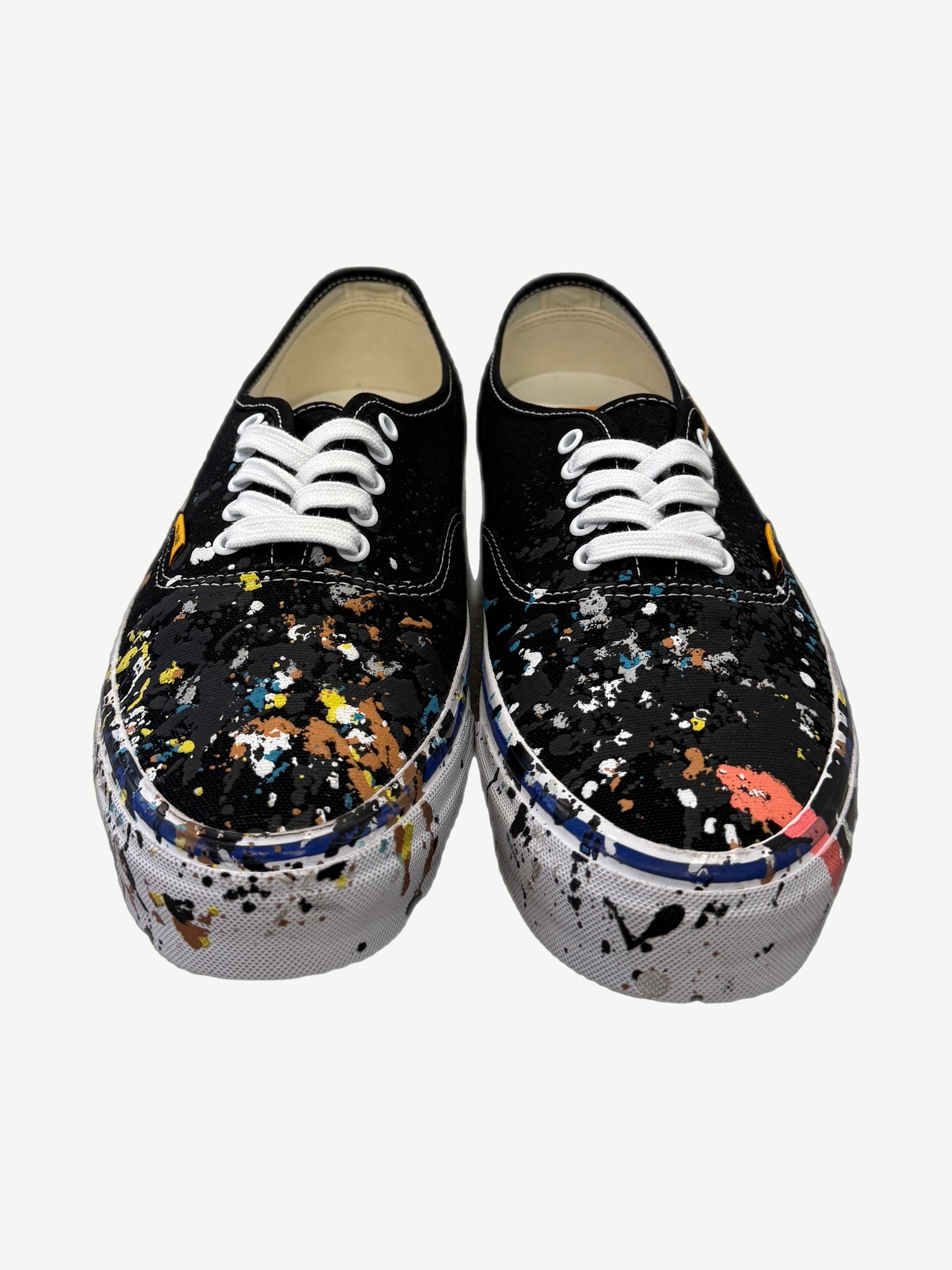 Gallery Dept Art That Kills Vans top view with multicolor paint splatter across black canvas uppers.