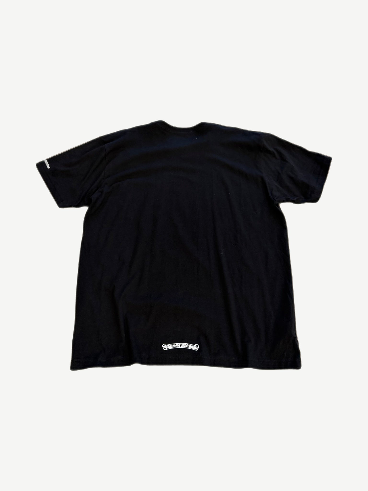 Chrome Hearts black pocket tee back with large gothic Chrome Hearts horseshoe scroll logo print.
