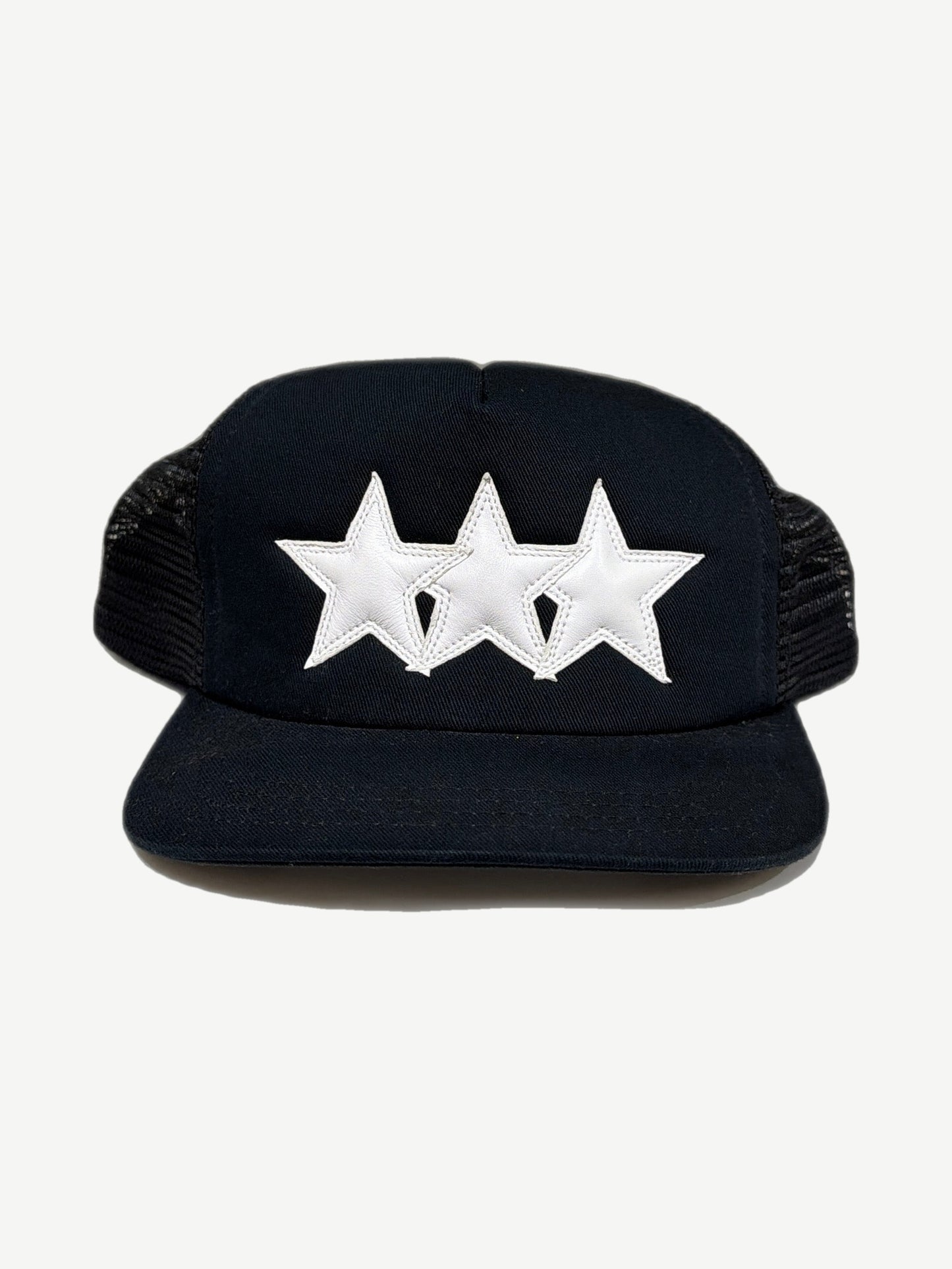 Chrome Hearts black and white triple star foam trucker hat with embroidered stars on front panel.