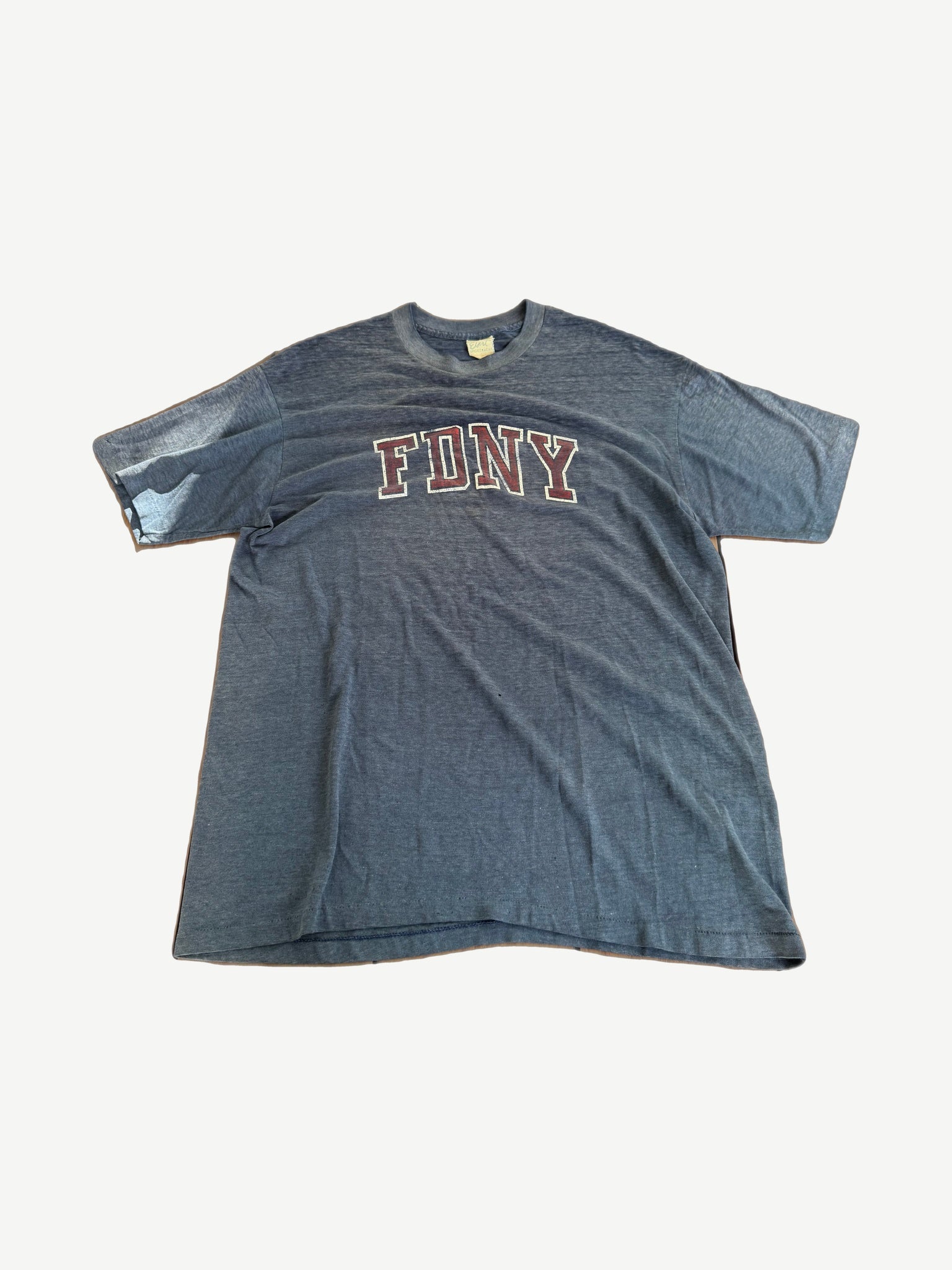 Vintage FDNY tee in faded navy with maroon arched FDNY varsity letters across chest