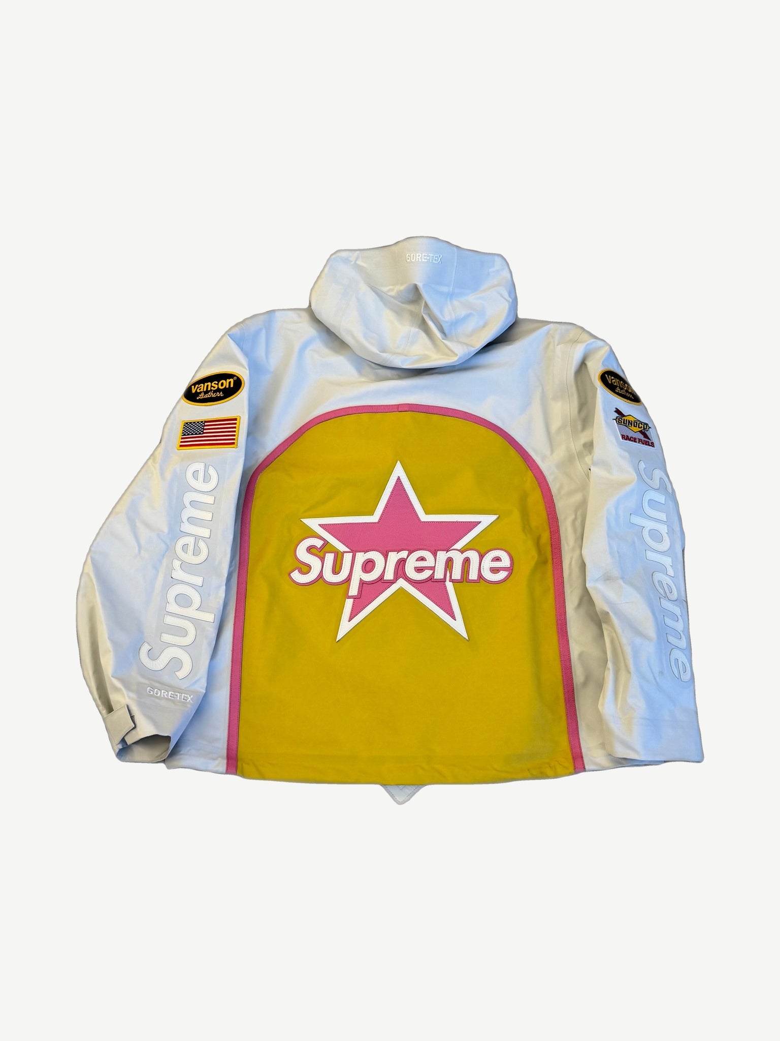 Supreme Vanson white GORE-TEX shell back view with yellow and pink Supreme star graphic and sleeve text