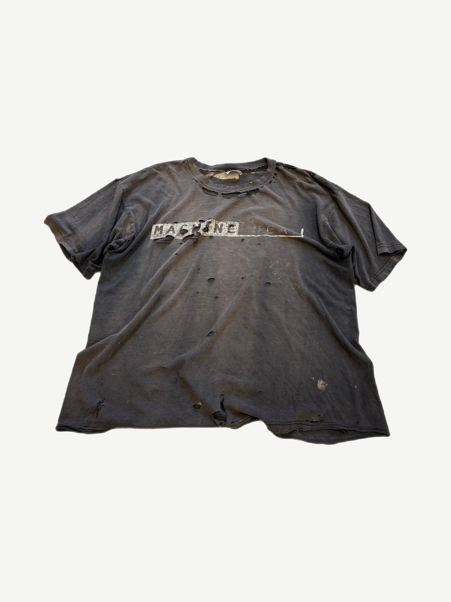 Vintage Machine Head band tee in heavily distressed faded black cotton with worn front logo print and holes
