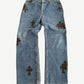 Chrome Hearts x Levis 517 dark wash jeans front view with custom black leather cross patch on the front pocket