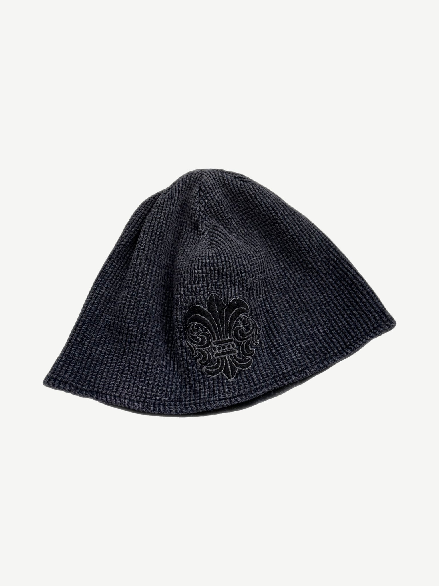Vintage Chrome Hearts navy thermal waffle knit skully beanie with embroidered fleur de lis emblem.
