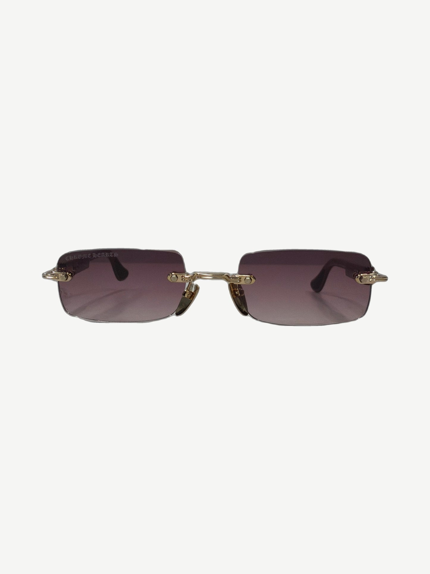 Chrome Hearts Wood Deep 1 rimless sunglasses front view with purple gradient lenses and gold chain-link bridge