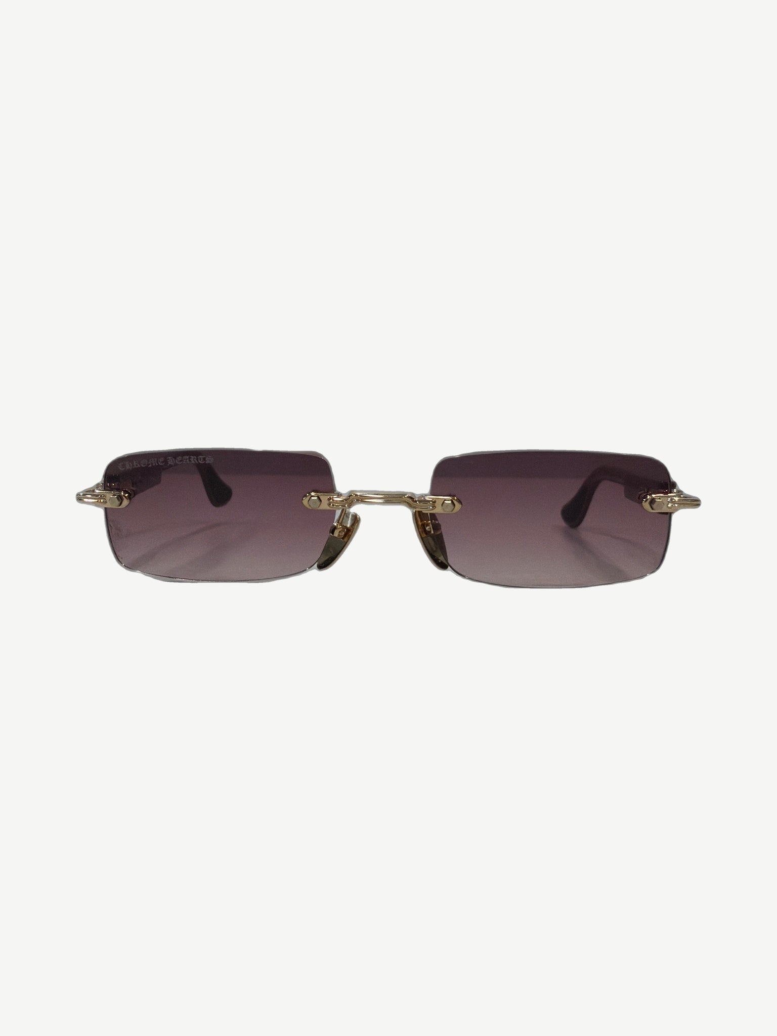 Chrome Hearts Wood Deep 1 rimless sunglasses front view with purple gradient lenses and gold chain-link bridge