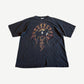 Vintage Ozzy Osbourne tee in faded black with orange flame spider web and Ozzy silhouette graphic.