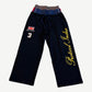Protocol Index black wide leg layered sweatpants front with Union Jack patch and cursive leg script.