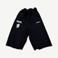 Protocol Index black folded waist sweat shorts front with white Protocol Index 9 logo on left leg