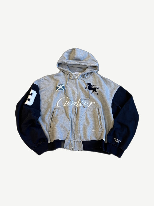 Protocol Index Cuntier melange grey full zip hoodie front with navy sleeves, horse crest and varsity 3 patch.