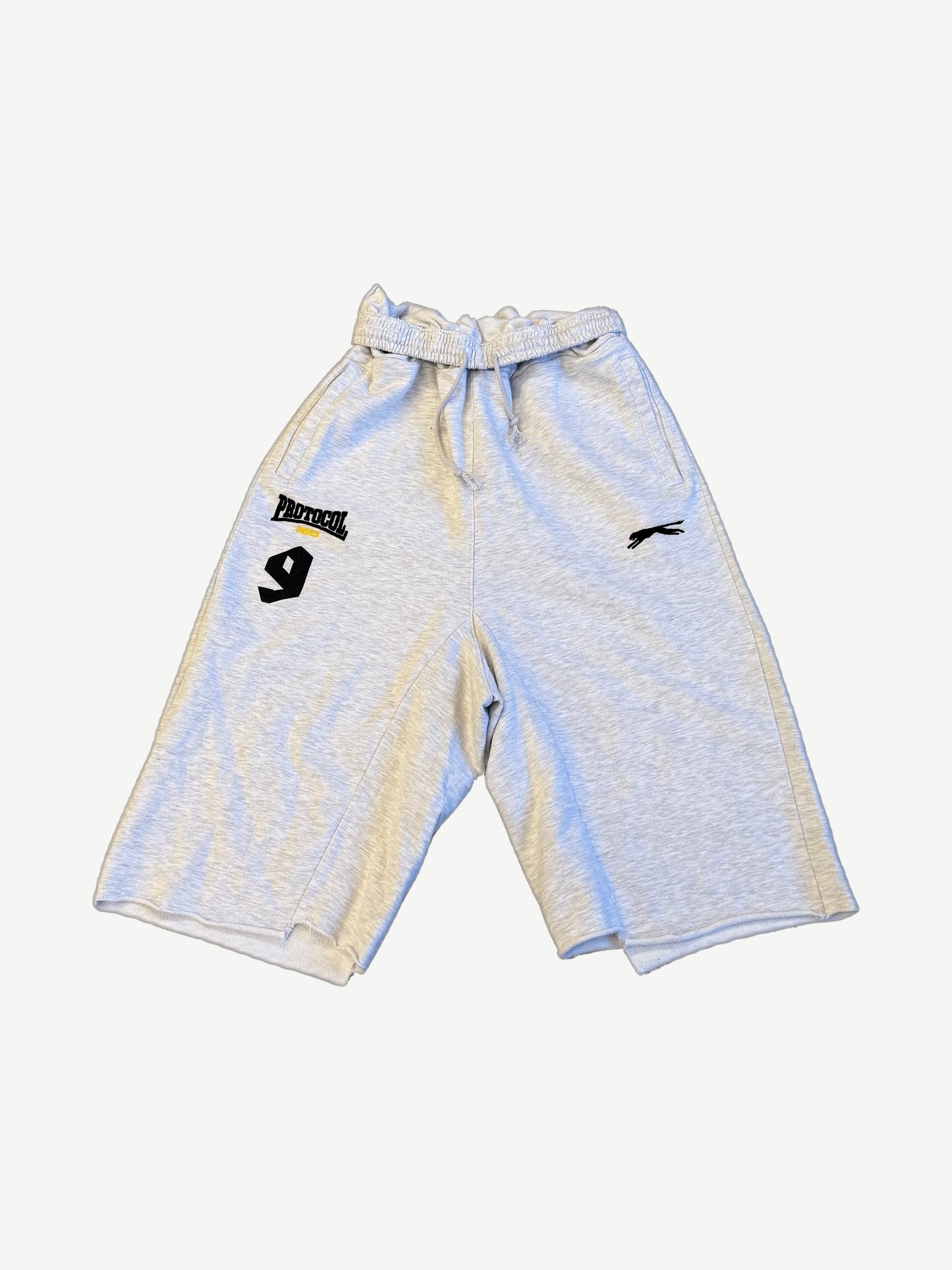 Protocol Index grey melange shorts front, folded drawstring waist with Protocol 9 chest patch and Slazenger logo.