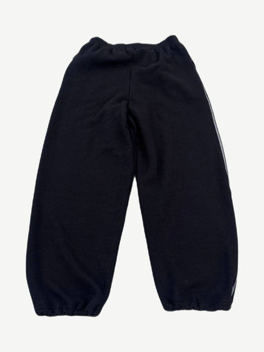Raspberry Hills Berry black sweatpants back view showing exposed contrast stitching down inseam and elastic ankle cuffs.