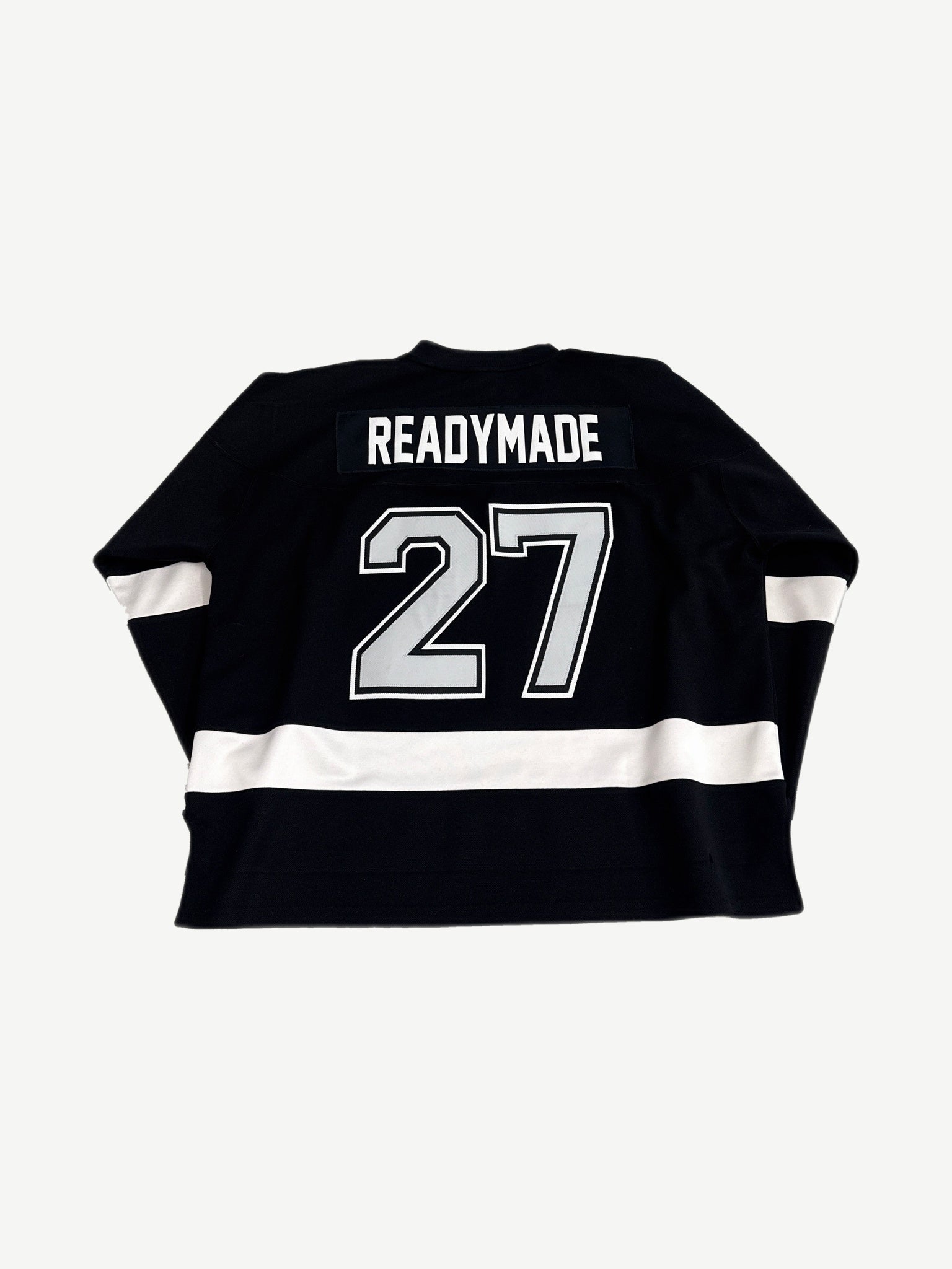 Readymade black hockey jersey back with READYMADE nameplate and large number 27 patch