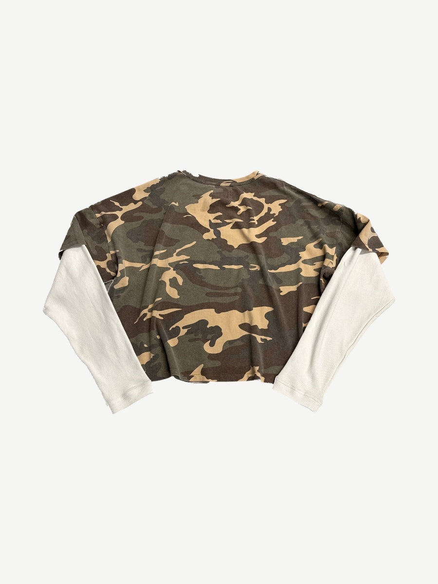 Rhude camo double layered longsleeve back view showing woodland print torso and long cream thermal cuffs.