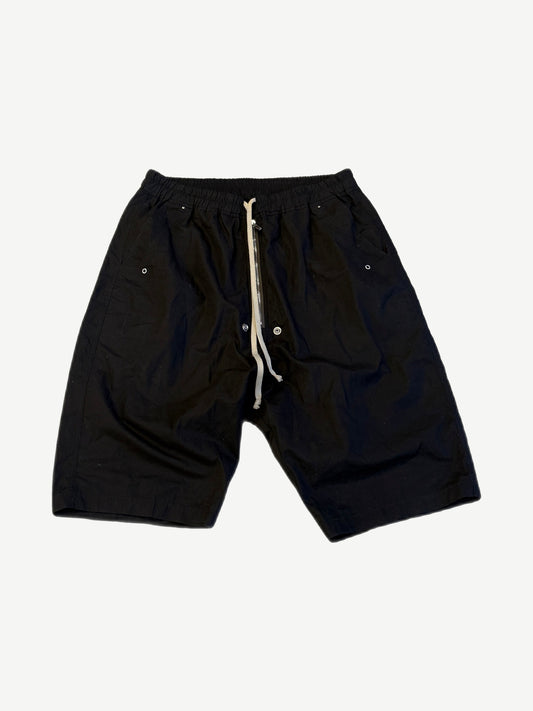 Rick Owens Bela Pods black drawstring shorts front with cream cord drawstring and zip pocket.