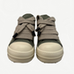 Rick Owens celadon suede sneaker front close up emphasizing oversized woven laces and cream toe cap