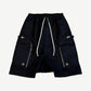 Rick Owens DRKSHDW black Bauhaus Pods shorts with side zip cargo pockets and drop crotch drawstring