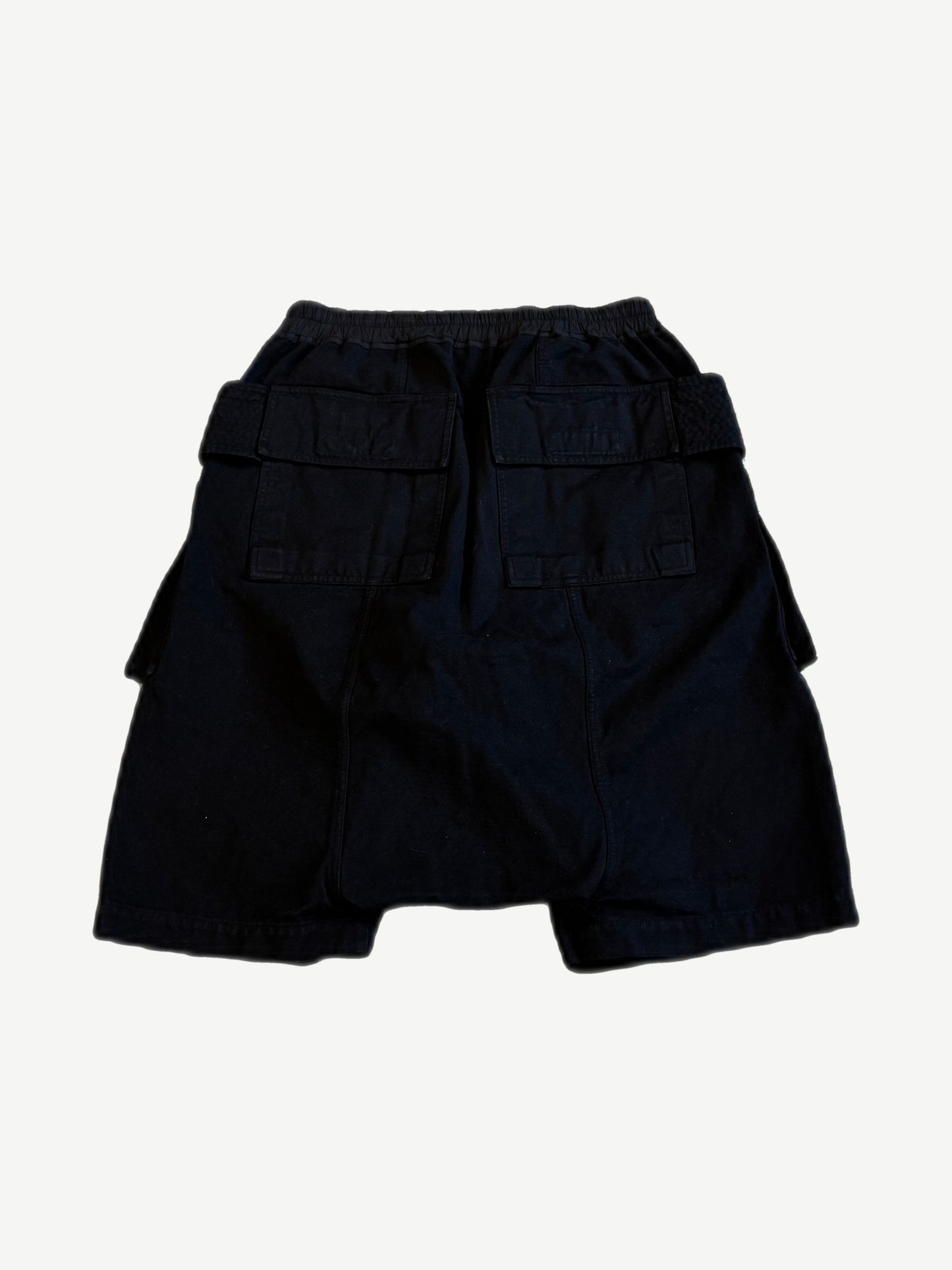 Rick Owens DRKSHDW Creatch cargo shorts back view in black with twin back flap pockets and elastic waist.