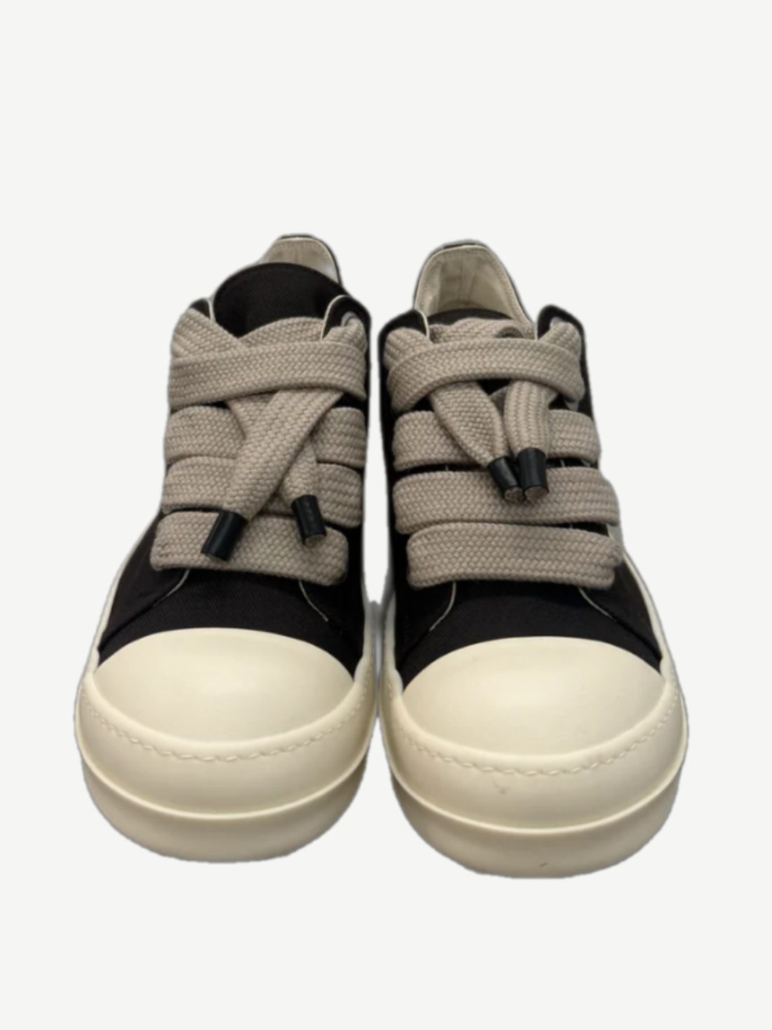 Front view of Rick Owens DRKSHDW black sneakers showing thick cream jumbo laces and oversized tongue