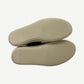 Rick Owens DRKSHDW Dark Dust sneakers rear angle, grey canvas heel with white rubber midsole detail.