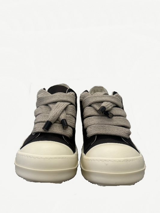 Rick Owens DRKSHDW Dark Dust sneakers side profile, distressed grey canvas with chunky vulcanized rubber sole.