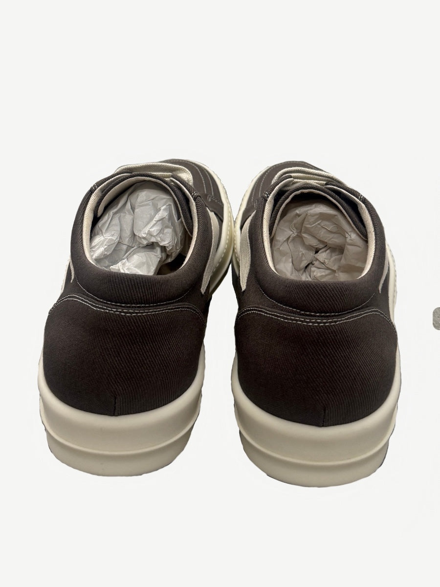 Rick Owens DRKSHDW Dark Dust sneakers angled side view showing aged canvas vamp and chunky outsole