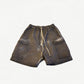 Rick Owens DRKSHDW Bela cargo shorts in faded dust brown waxed cotton with front zip, drawstring