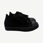 Rick Owens DRKSHDW triple black low top sneakers side view with jumbo laces and rubber cap toe