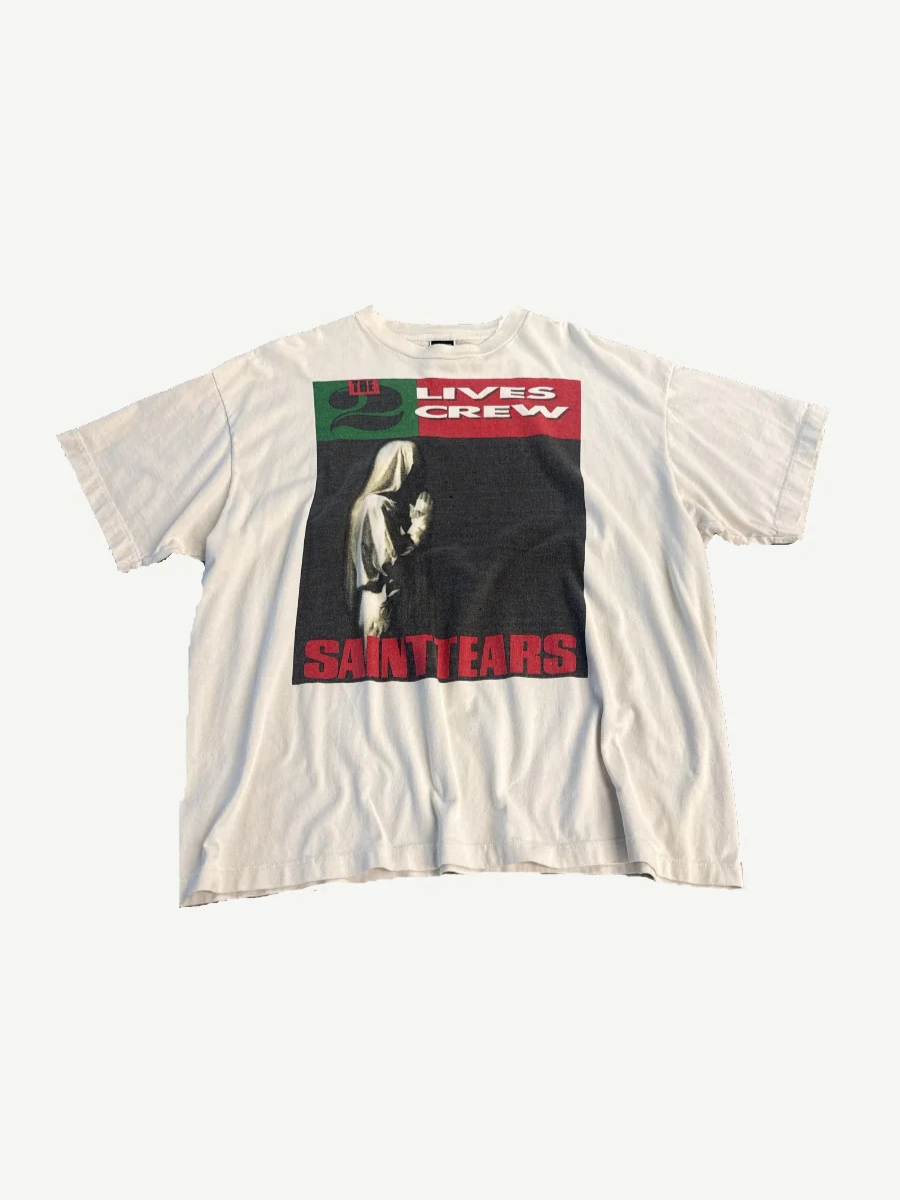 Saint Michael x Denim Tears Live Crew tee in cream with bold black How Many Lifetimes graphic typography