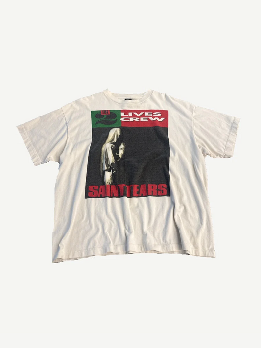 Saint Michael x Denim Tears Live Crew tee in cream with bold black How Many Lifetimes graphic typography