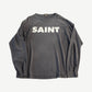 Saint Michael gray long sleeve tee with bold black SNT logo across the chest, ribbed crew neck and cuffs.