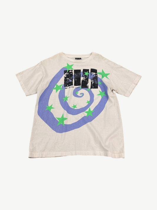 Saint Michael cream Humanity tee front with blue spiral and green stars photo-collage graphic