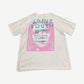 Saint Michael Humanity tee back with pink portrait box and teal Saint Youth slogan print