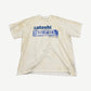 Satoshi Nakamoto cream Don't Forget To Smile tee with paint splatter and blue dental x-ray print