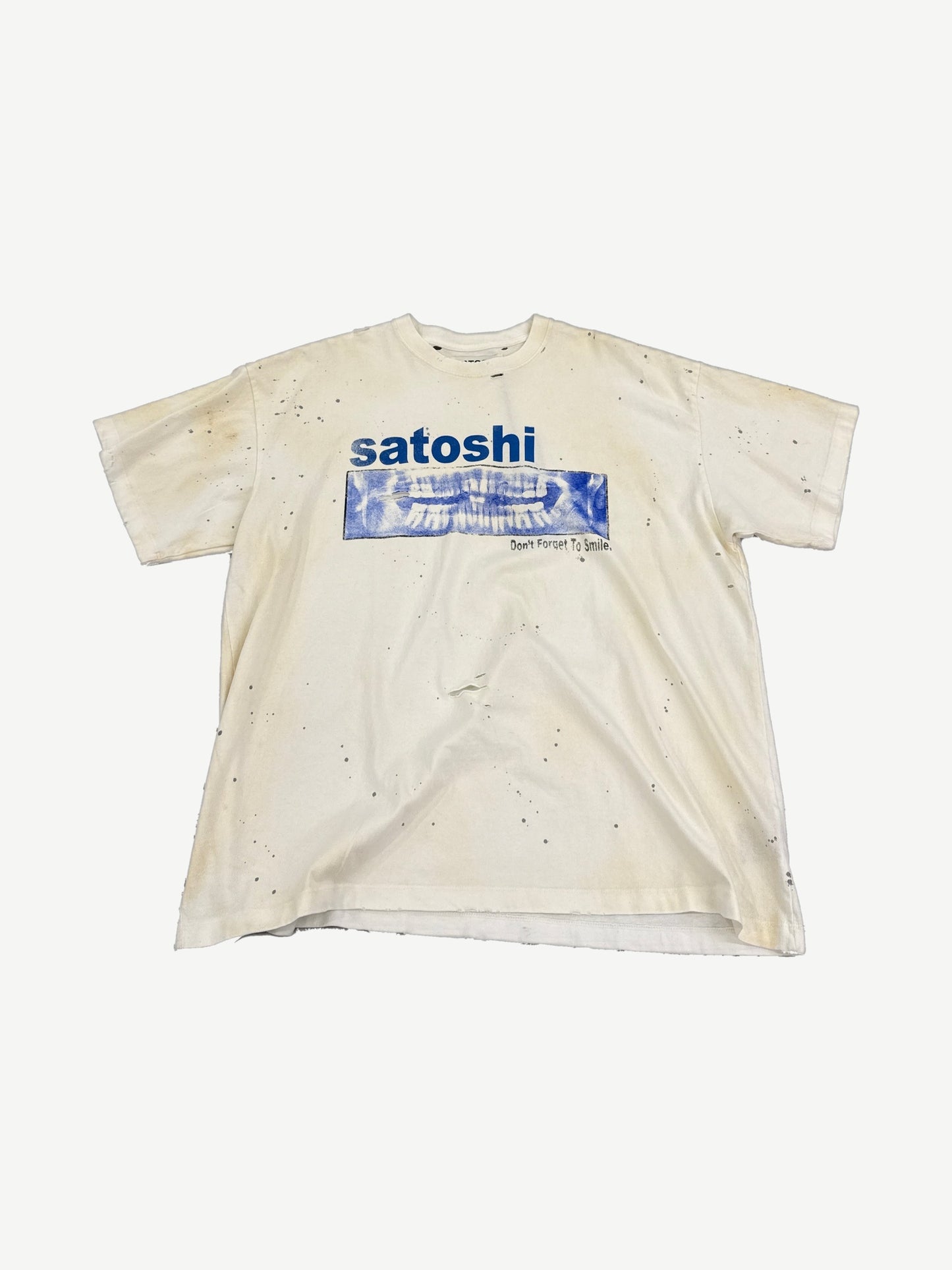 Satoshi Nakamoto cream Don't Forget To Smile tee with paint splatter and blue dental x-ray print