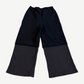 Back view of Satoshi Nakamoto black sweatpants with gray waffle thermal layered lower legs and elastic waist