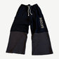 Satoshi Nakamoto black double-layer sweatpants with studded vertical logo and gray waffle thermal lower panels